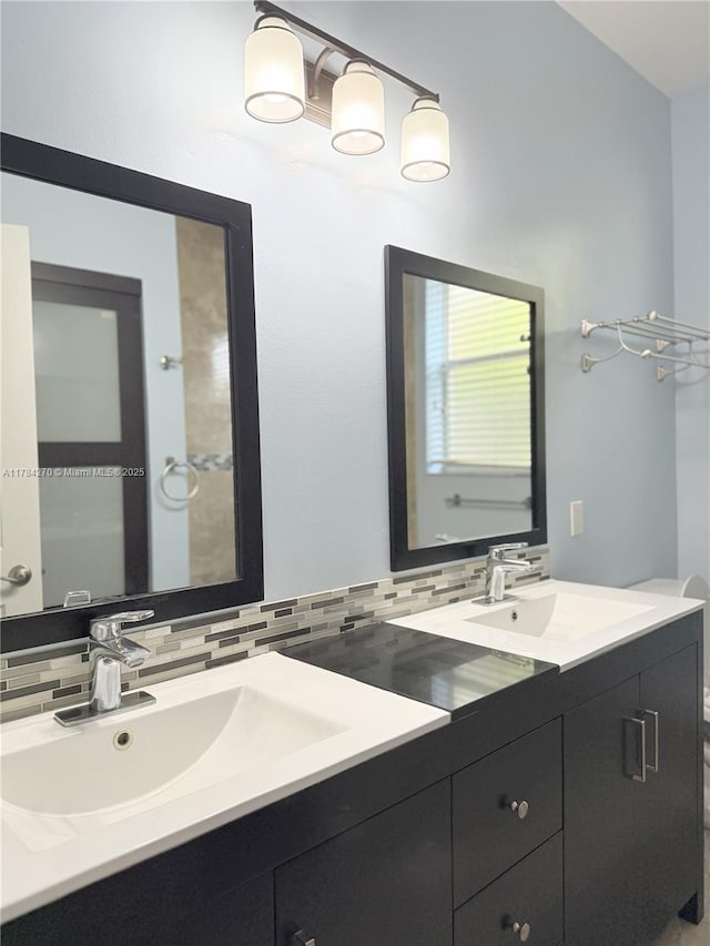 5352 NW 57th Ter, Coral Springs, FL 33067 - bathroom featuring backsplash and double vanity