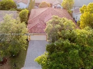 5352 NW 57th Ter, Coral Springs, FL 33067 - aerial view of property and surrounding area