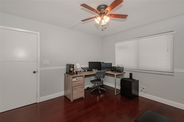 office space with wood finished floors, a textured ceiling, a ceiling fan, and baseboards