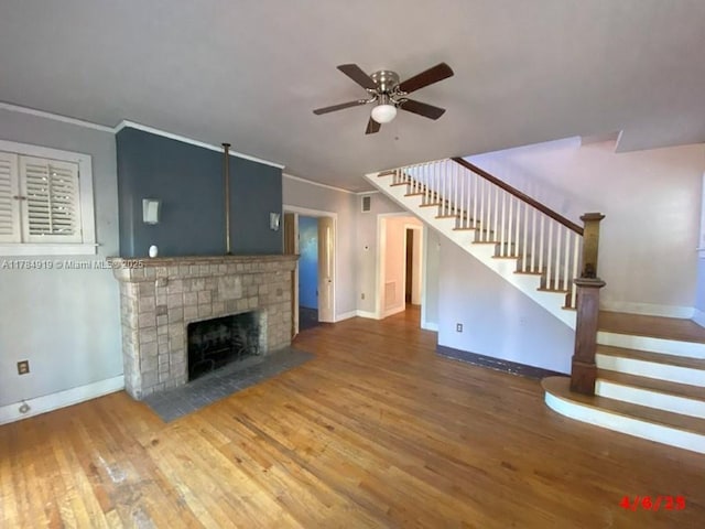 1722 Jefferson Ave, Miami Beach, FL 33139 - unfurnished living room featuring baseboards, wood finished floors, and ceiling fan