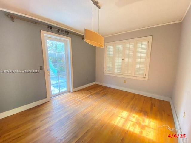 1722 Jefferson Ave, Miami Beach, FL 33139 - spare room with wood finished floors and baseboards