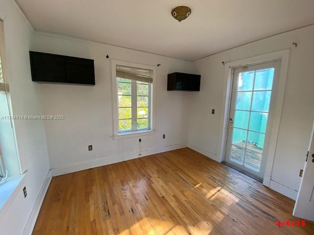 1722 Jefferson Ave, Miami Beach, FL 33139 - unfurnished room with baseboards and light wood-type flooring