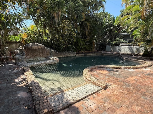 1722 Jefferson Ave, Miami Beach, FL 33139 - view of swimming pool with a patio area, a fenced backyard, and a fenced in pool