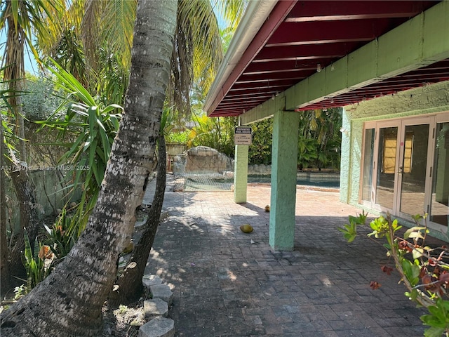 1722 Jefferson Ave, Miami Beach, FL 33139 - view of yard with a patio, french doors, and fence