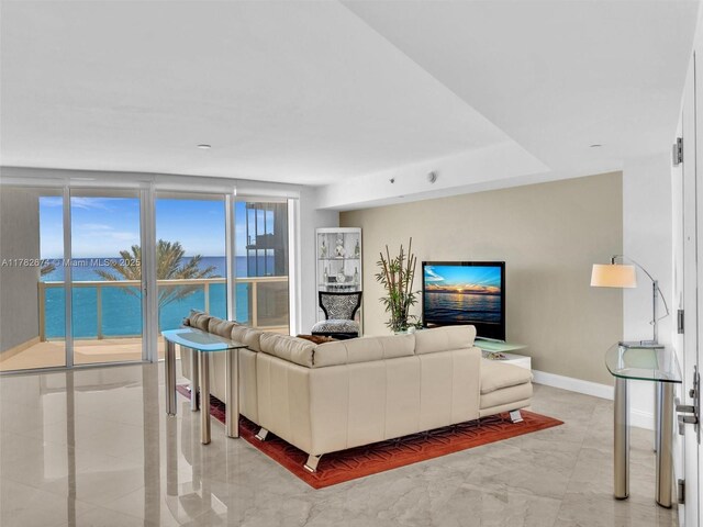 17201 Collins Ave Unit 704, Sunny Isles Beach, FL 33160 - living area featuring baseboards and marble finish floor