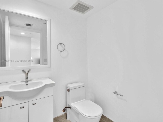 17201 Collins Ave Unit 704, Sunny Isles Beach, FL 33160 - laundry room with washer and dryer, cabinet space, baseboards, visible vents, and electric panel