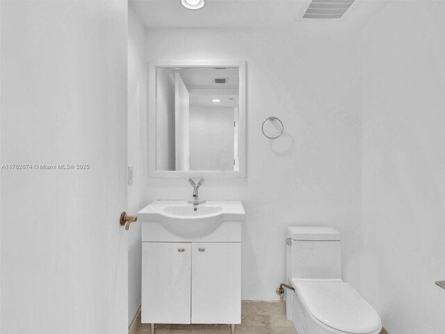 17201 Collins Ave Unit 704, Sunny Isles Beach, FL 33160 - bathroom with toilet, visible vents, and vanity