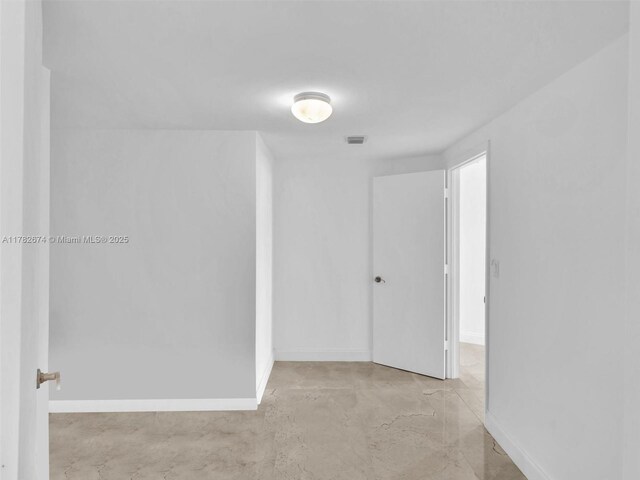 17201 Collins Ave Unit 704, Sunny Isles Beach, FL 33160 - empty room featuring baseboards