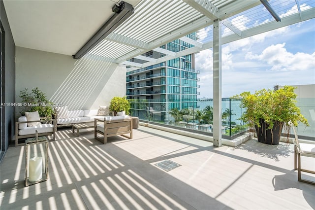 650 NE 32nd St Unit Bh6, Miami, FL 33137 - balcony featuring an outdoor living space and a water view