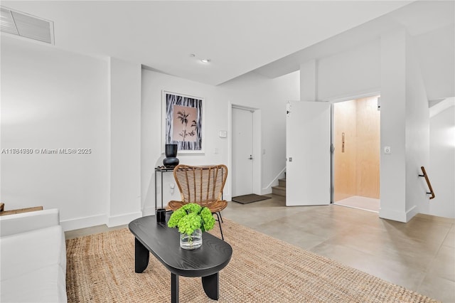 650 NE 32nd St Unit Bh6, Miami, FL 33137 - sitting room featuring recessed lighting, concrete floors, and stairs