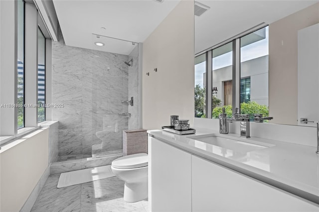 650 NE 32nd St Unit Bh6, Miami, FL 33137 - full bath featuring vanity, a marble finish shower, marble finish flooring, and recessed lighting