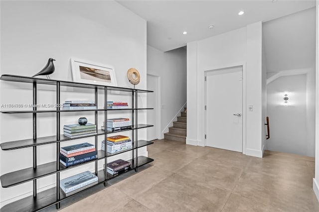 650 NE 32nd St Unit Bh6, Miami, FL 33137 - hall featuring stairway, recessed lighting, and finished concrete floors