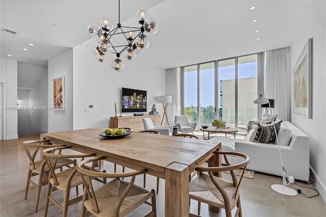 650 NE 32nd St Unit Bh6, Miami, FL 33137 - dining area with concrete floors, recessed lighting, floor to ceiling windows, and a chandelier