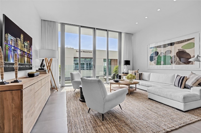 650 NE 32nd St Unit Bh6, Miami, FL 33137 - living room with expansive windows, concrete flooring, and recessed lighting