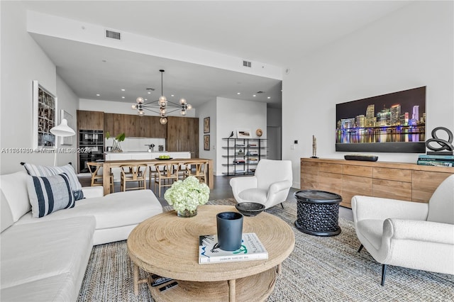 650 NE 32nd St Unit Bh6, Miami, FL 33137 - living area featuring a chandelier and recessed lighting