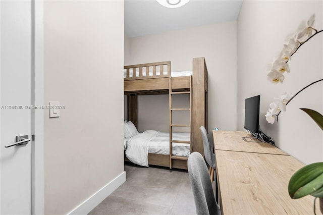 650 NE 32nd St Unit Bh6, Miami, FL 33137 - bedroom featuring concrete flooring and baseboards