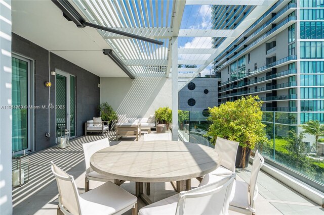 650 NE 32nd St Unit Bh6, Miami, FL 33137 - view of patio with outdoor dining area