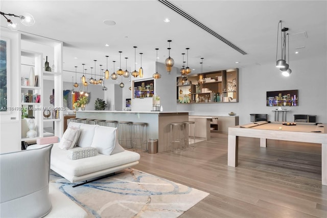 650 NE 32nd St Unit Bh6, Miami, FL 33137 - living area featuring light wood-style flooring, billiards table, and bar area