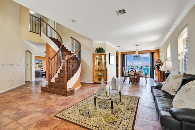16519 SW 54th Ct, Miramar, FL 33027 - living room with ornamental molding, stairs, and arched walkways