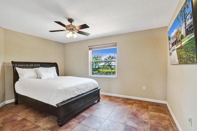 16519 SW 54th Ct, Miramar, FL 33027 - bedroom featuring baseboards, a ceiling fan, and tile patterned floors