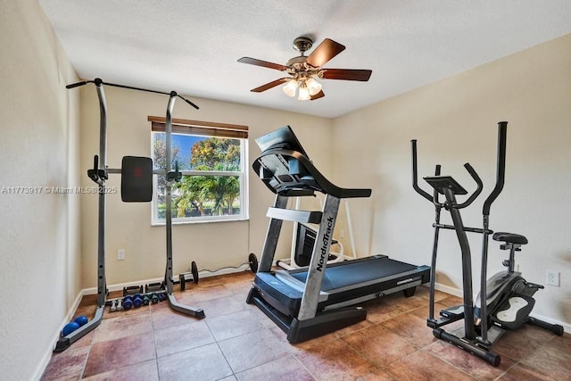 16519 SW 54th Ct, Miramar, FL 33027 - workout area with a ceiling fan, baseboards, and a textured ceiling