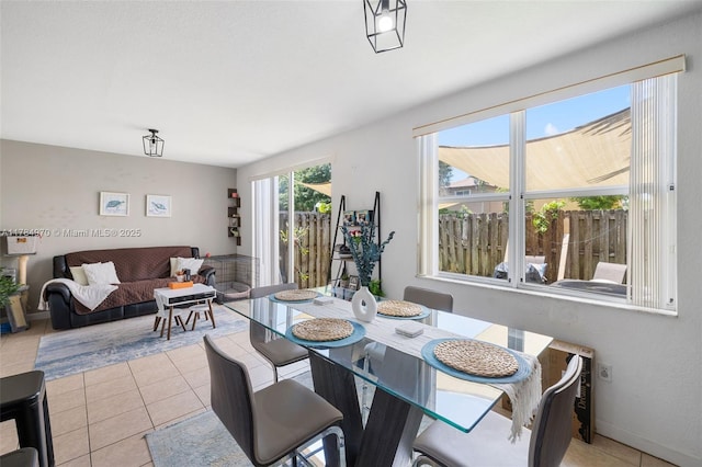 1074 NE 41st Pl, Homestead, FL 33033 - dining space with light tile patterned floors