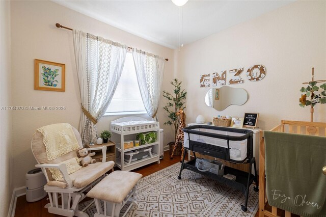 1074 NE 41st Pl, Homestead, FL 33033 - living area with wood finished floors and baseboards