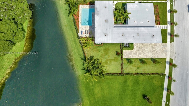 drone / aerial view featuring a water view