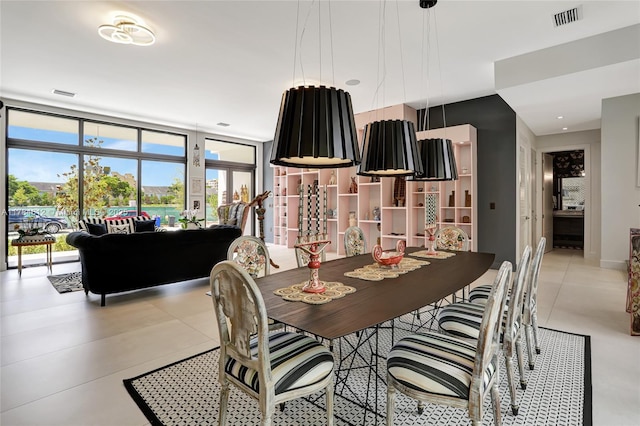 dining area featuring visible vents