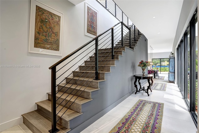 staircase with baseboards