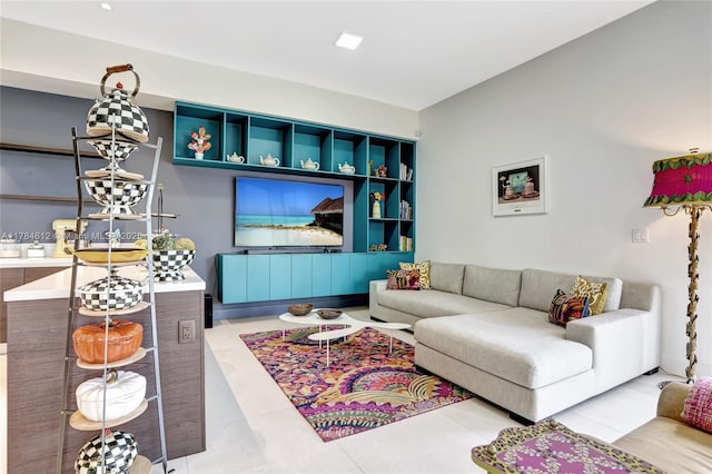 living room with tile patterned floors