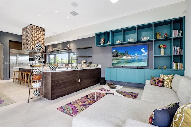 living room with visible vents and recessed lighting