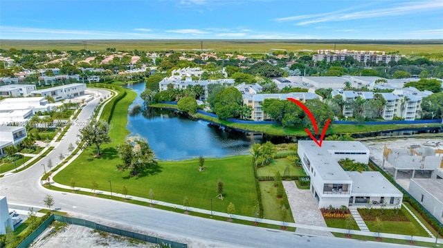drone / aerial view with a water view