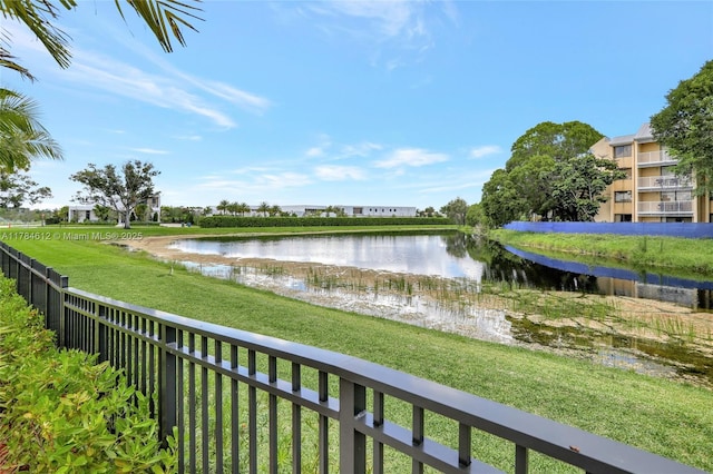 view of water feature with fence