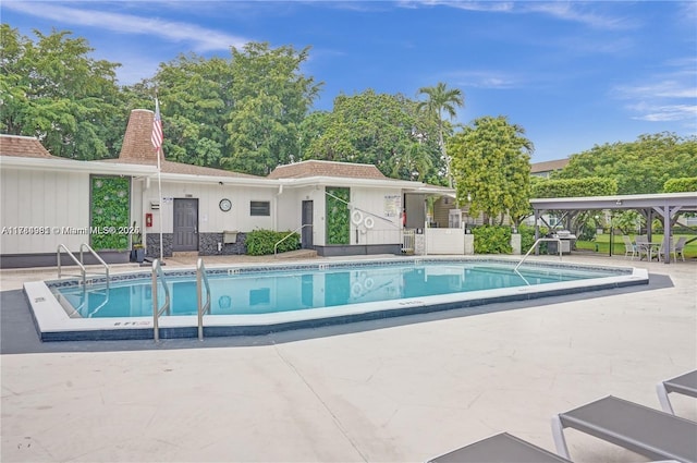 pool with a patio area