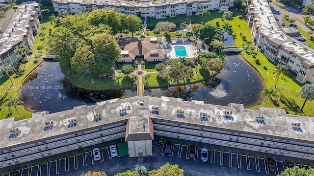 drone / aerial view with a water view