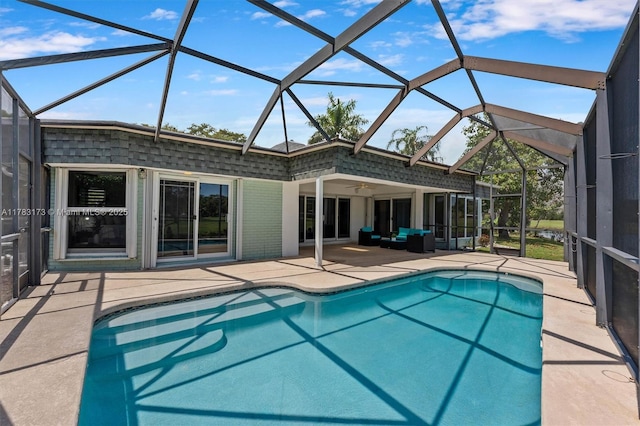 5721 Bayberry Ln, Tamarac, FL 33319 - swimming pool featuring a patio area, a ceiling fan, an outdoor living space, and glass enclosure