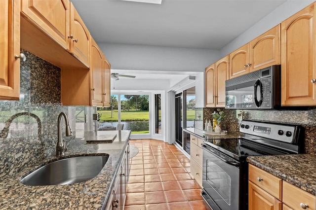 5721 Bayberry Ln, Tamarac, FL 33319 - kitchen featuring black appliances, a ceiling fan, backsplash, and light brown cabinetry