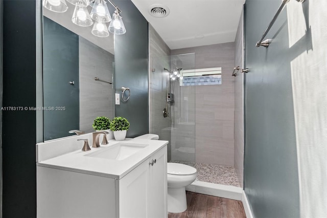 5721 Bayberry Ln, Tamarac, FL 33319 - full bath with vanity, a tile shower, and wood finished floors