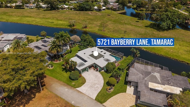 5721 Bayberry Ln, Tamarac, FL 33319 - aerial view of residential area with a large body of water