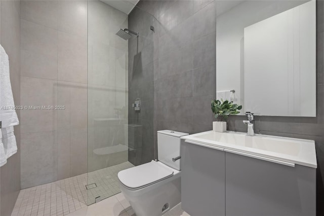 3070 Elizabeth St Unit 3070, Coconut Grove, FL 33133 - bathroom with vanity, tiled shower, toilet, tile walls, and tile patterned flooring