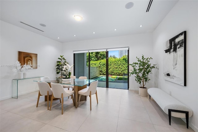 3070 Elizabeth St Unit 3070, Coconut Grove, FL 33133 - dining room with baseboards, light tile patterned flooring, and recessed lighting
