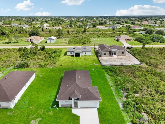 drone / aerial view with a residential view