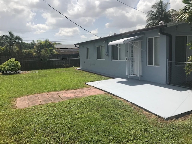 1221 W 62nd St, Hialeah, FL 33012 - view of yard featuring a patio and fence