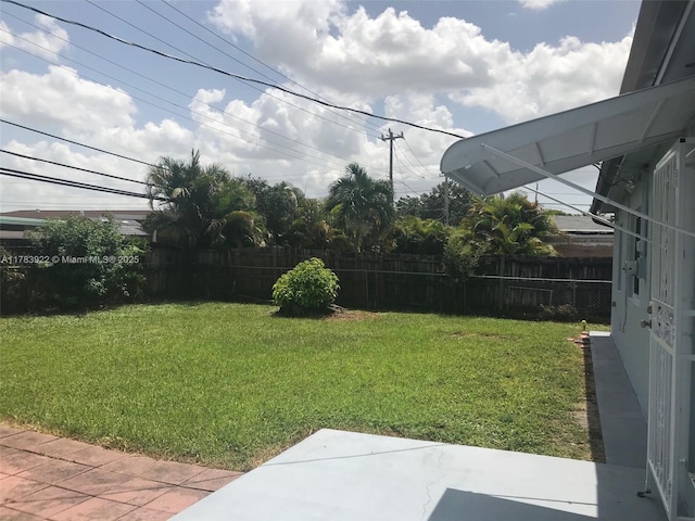 1221 W 62nd St, Hialeah, FL 33012 - view of yard with a patio area and a fenced backyard