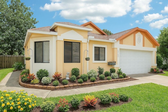711 Holly St, North Lauderdale, FL 33068 - view of front facade featuring a garage, driveway, stucco siding, and fence
