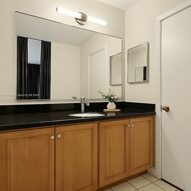 711 Holly St, North Lauderdale, FL 33068 - bathroom featuring vanity and tile patterned flooring