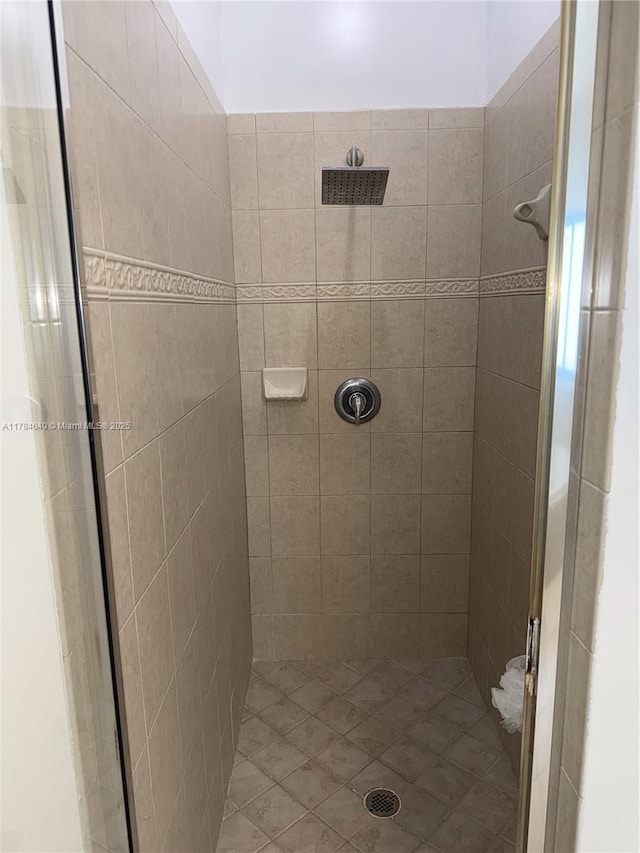 bathroom with a shower stall