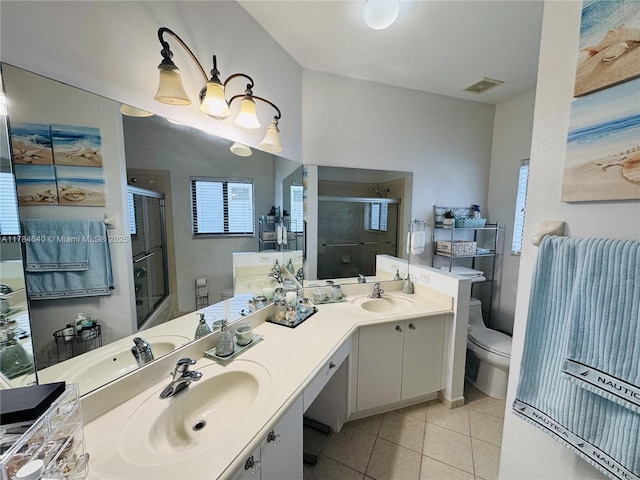 full bathroom with a shower stall, tile patterned floors, visible vents, and a sink