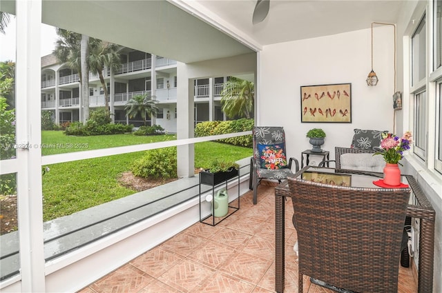 581 Blue Heron Dr Unit 112-B, Hallandale Beach, FL 33009 - sunroom / solarium featuring an outdoor living space
